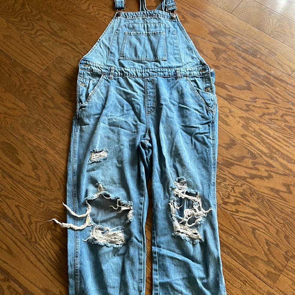 Distressed jean overalls